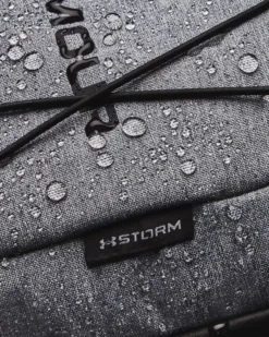 UA Hustle Sport-Rucksack 13 UA Hustle Sport-Rucksack -Modegeschäft Für Sportbekleidung 1364181 012 STORM SL